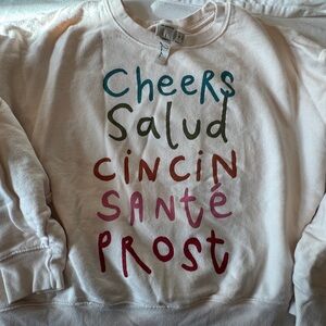 Anthropologie Maeve Jordan Nikkson multilingual CHEERS sweatshirt. Women medium